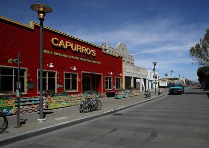 Jefferson Street in the Fisherman’s Wharf tourist destination sits empty during shelter-in-place. Businesses on the wharf are hoping for rent relief because of the coronavirus crisis.
