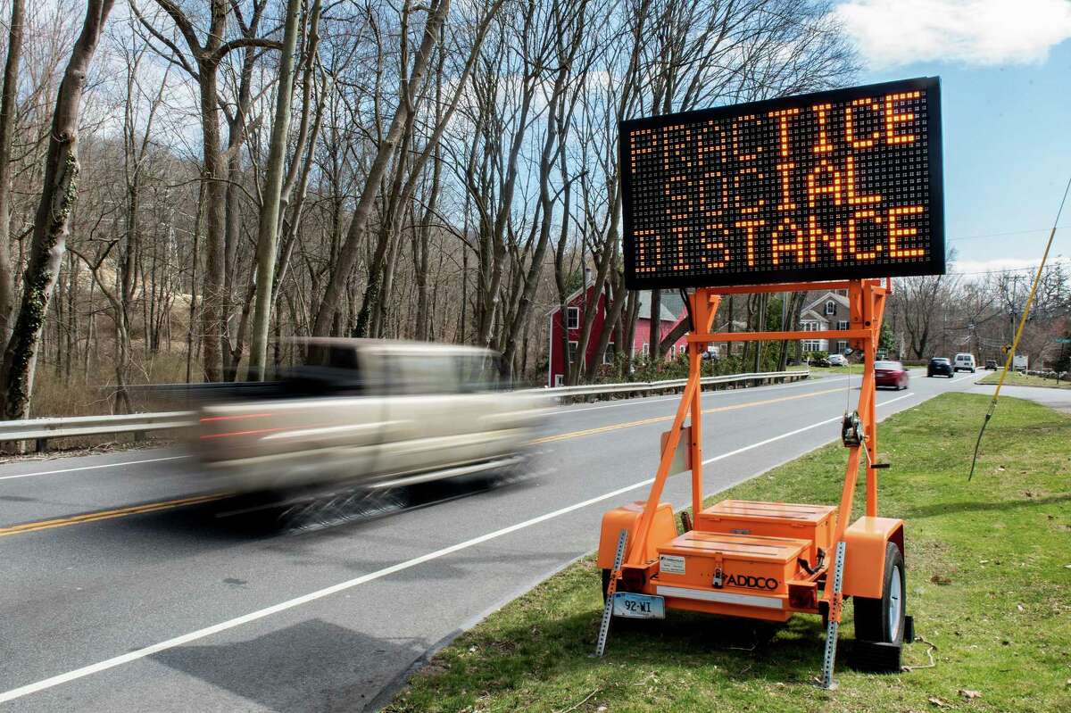 A sign of the times in Wilton along Route 7.