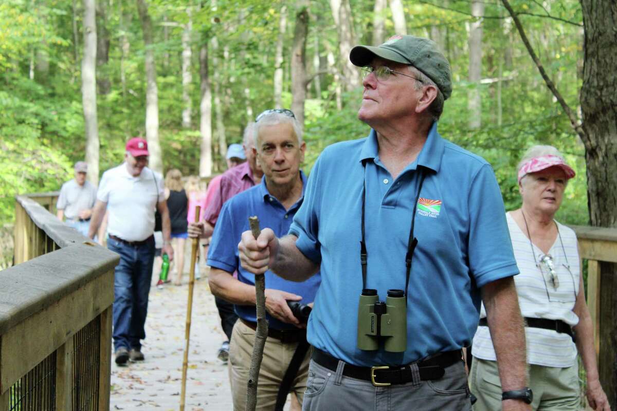 Friends of the Norwalk River Valley Trail is a past recipient of a Neighborhood Assistance Act grant. Here, Charlie Taney leads a bird walk for seniors with Stay at Home in Wilton.