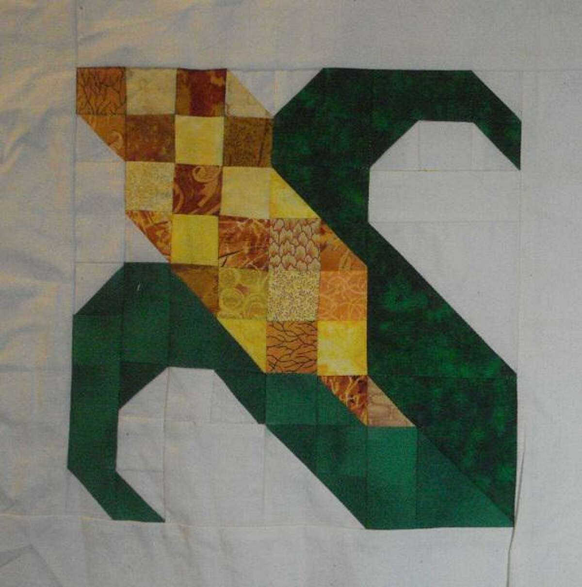 One of the new patterns to be showcased as part of the New Milford Barn Quilt Trail is the corn pattern, to be displayed at the Larson Barn at New Milford High School. The barn, built in 1900 as a dairy barn by Frank Larson, was later used for agriculture. Starting in 1957, the Larsons were known for their sweet corn, which they sold at a farm stand along Route 7.