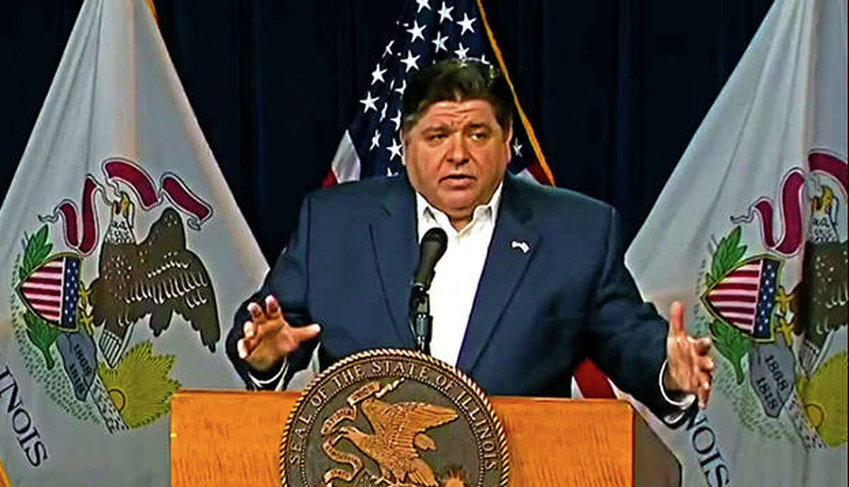 Gov. J.B. Pritzker responds to questions by the press during Wednesday’s daily COVID-19 briefing.