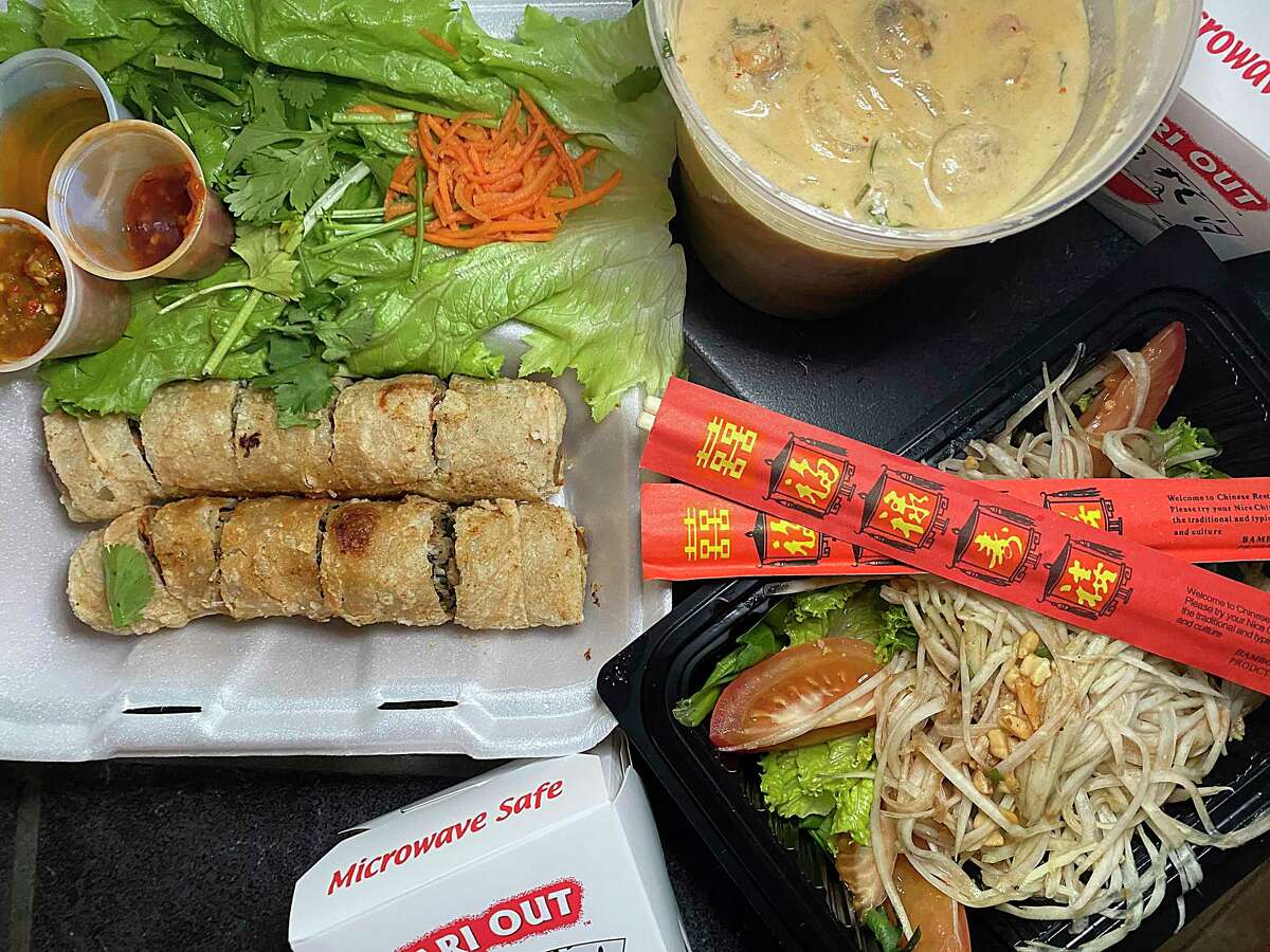 Takeout options include from, left, fried spring rolls, tom kha gai soup and Thai-style papaya salad at Tong's Thai, one of many San Antonio restaurants stepping up their takeout game during the coronavirus crisis.