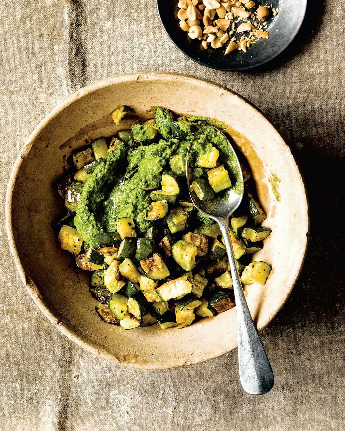 Oven-roasted Zucchini With Collard-Peanut Pesto from "Vegetable Kingdom," the new cookbook from Oakland chef Bryant Terry.