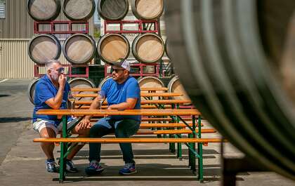 Donkey & Goat Winery, seen here in 2018, has communal tables set up outside. When it is allowed to reopen, it will likely have to reconfigure its seating arrangements, says co-owner Tracey Brandt.