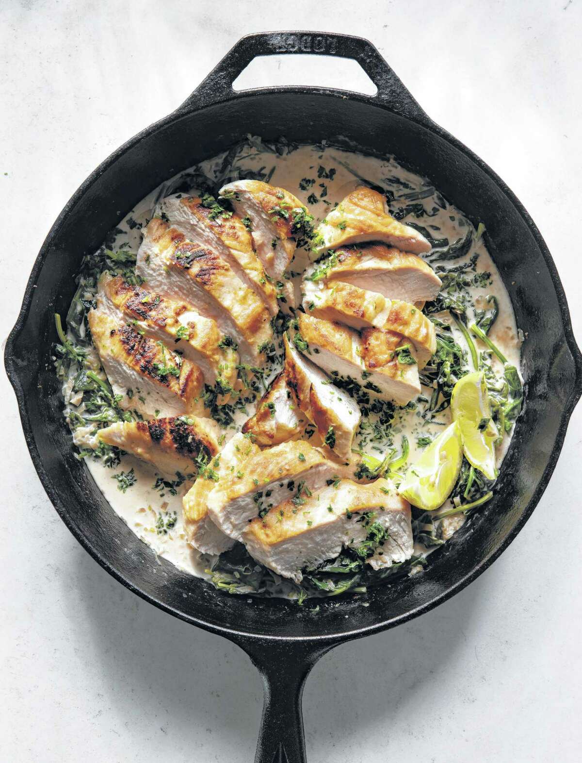Chicken Florentine is a recipe from "Magnolia Table: Volume 2" by Joanna Gaines.