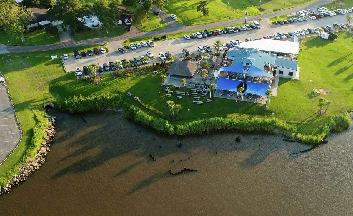 An aerial photo of Neches River near the Neches River Wheelhouse Wednesday evening. Port Neches will be working on its riverfront to prevent erosion by installing a bulkhead near the restaurant. Photo taken on Wednesday, 07/24/19. Ryan Welch/The Enterprise