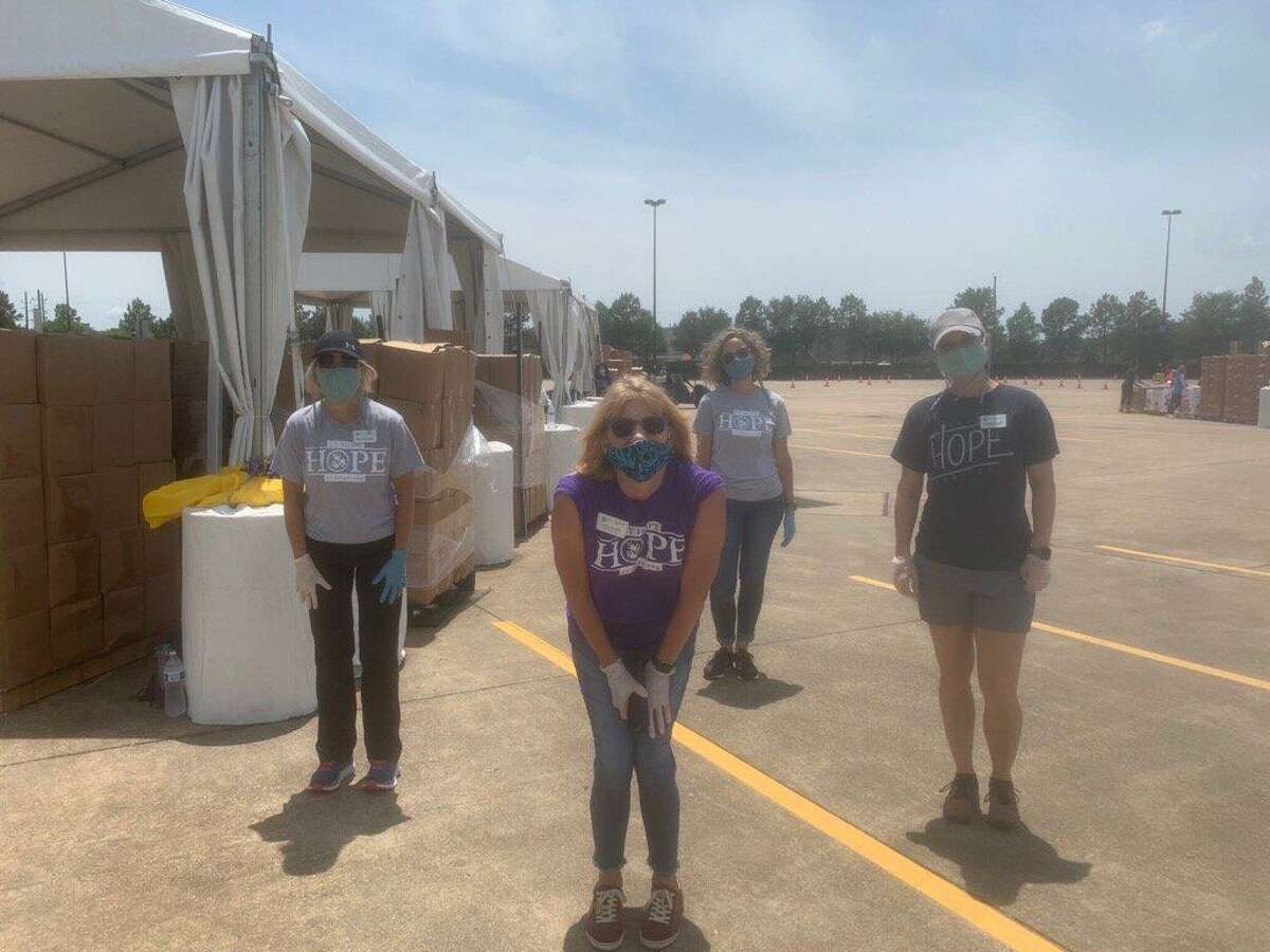 The mega food distribution on April 29, hosted by Houston Food Bank and Cy-Hope in the Berry Center parking lot, served 7,500 meals to families in the wake of the COVID-19 pandemic.