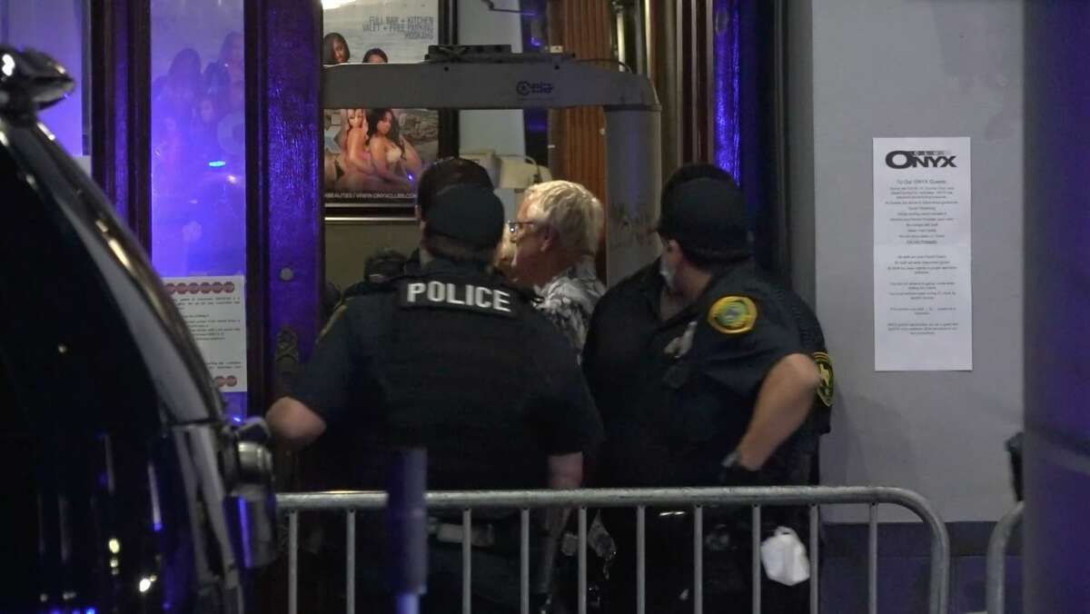 Houston police raid a strip club that opened as a restaurant Friday, May 1, 2020.
