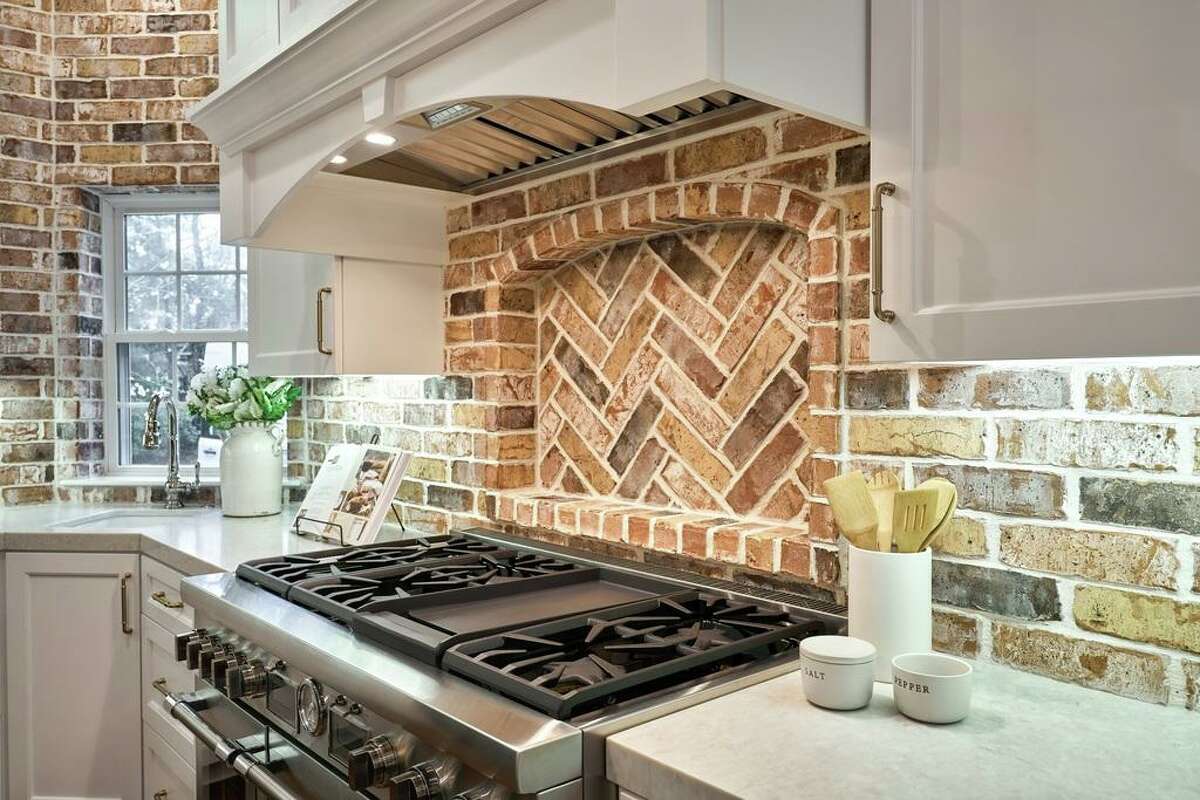 After: Brick was used as a decorative element in the kitchen.