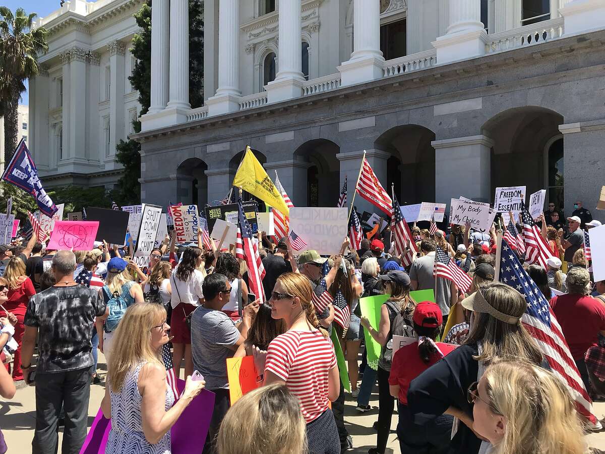 Protestors gathered at the state Capitol on May 1, 2020, to demand that Gov. Gavin Newsom reopen California, which is under a statewide stay-at-home order to slow the spread of the coronavirus.