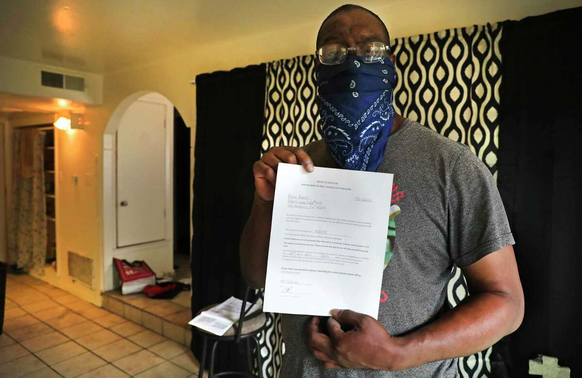 Alvin Brown, a renter at Spanish Oaks Apartments that is owned by Trif, has received a notice to vacate. Brown holds some of the paperwork he has received. A proposed ordinance, which was rejected last week, would have required landlords to give tenants 60 days’ notice to any proposed evictions, to give those tenants a chance to cure any rent delinquencies.
