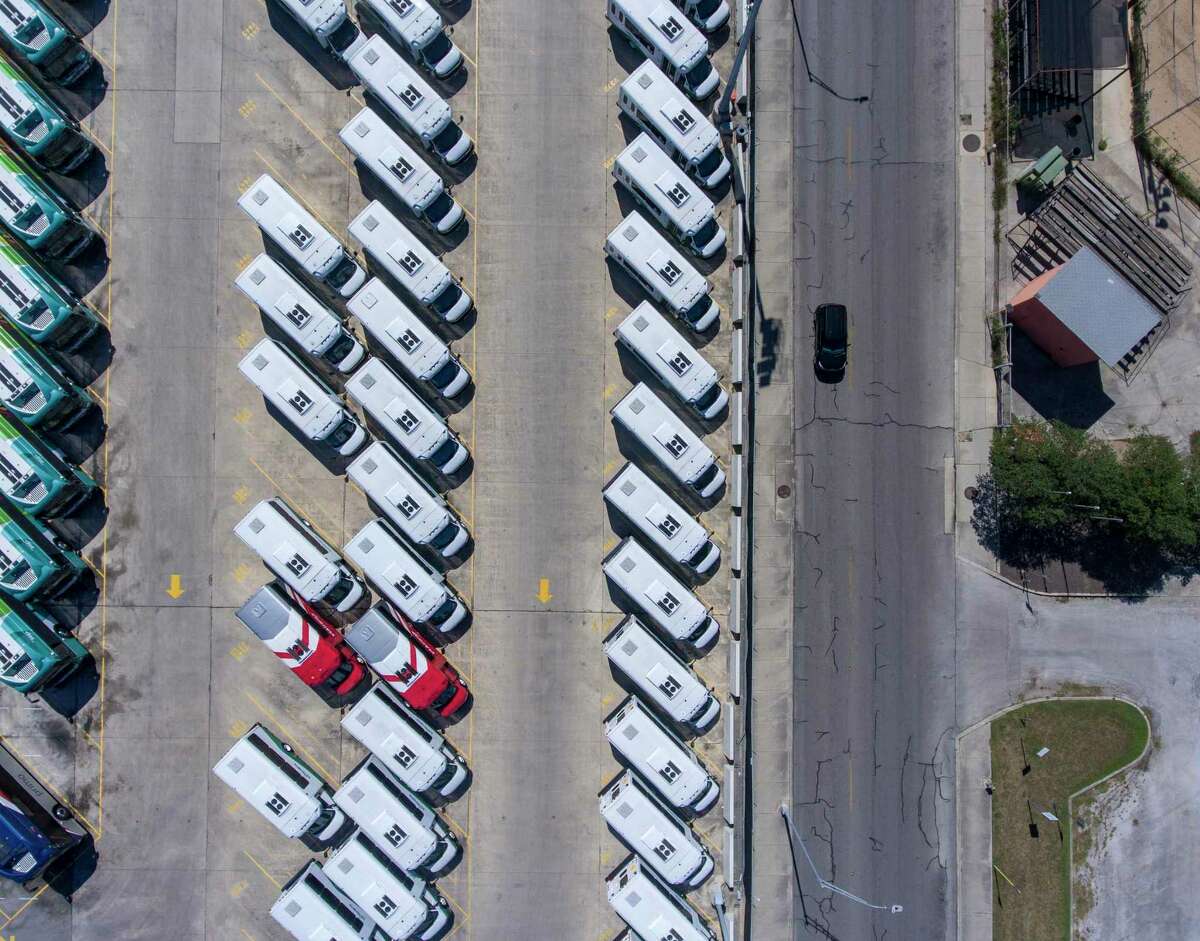 VIA Metropolitan Transit buses are seen in a Thursday aerial image. The coronavirus pandemic will likely delay a November election to reallocate a 1/8-cent city sales tax to fund VIA Reimagined, a proposed expansion of bus service, even as falling ridership and funding shortfalls are battering the transit agency.