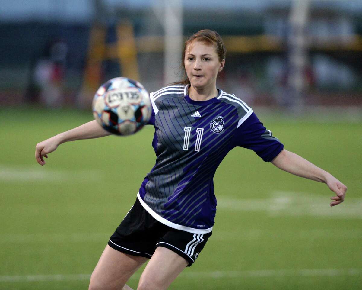 Amelia Hebert (11) of Fulshear traps a ball during the second half of a high school soccer game between the Foster Falcons and the Fulshear Chargers in the I-10 Shootout on Friday, January 11, 2019 at Morton Ranch High School, Katy, TX.