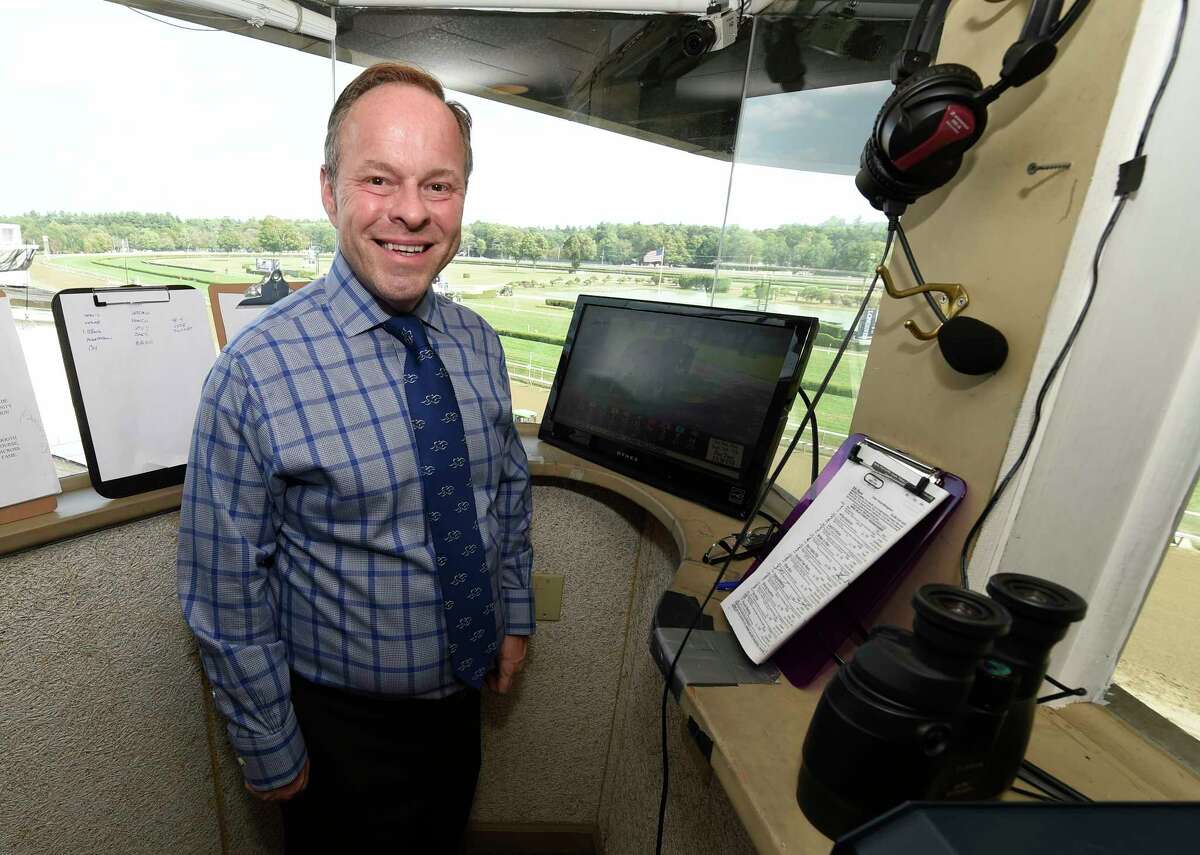 Track announcer Larry Collmus in his office Monday afternoon Aug. 31, 2015 at the Saratoga Race Course in Saratoga Springs, N.Y. (Skip Dickstein/Times Union)