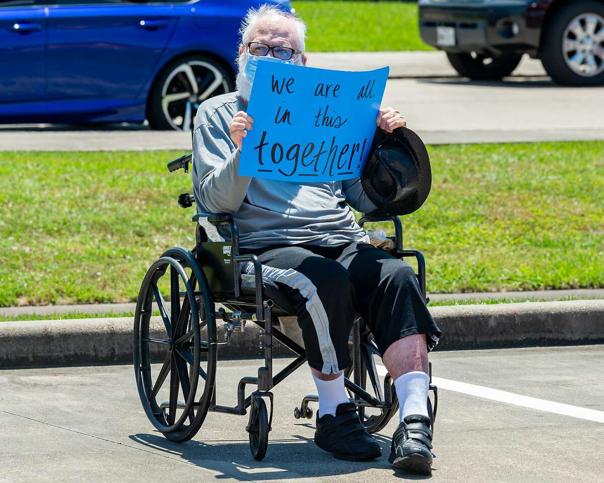 Family members in about a hundred cars paraded through the parking lot to see the nursing home residents of Focused Care at Summer Place on April 24, 2020. Fran Ruchalski/The Enterprise