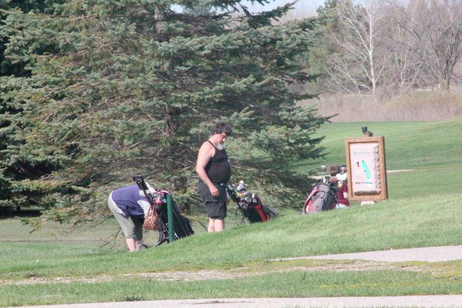 Golfers prepare to tee off at hole No. 1 on Saturday at Birch Valley Golf Course in Evart. (Pioneer photoi/John Raffel)