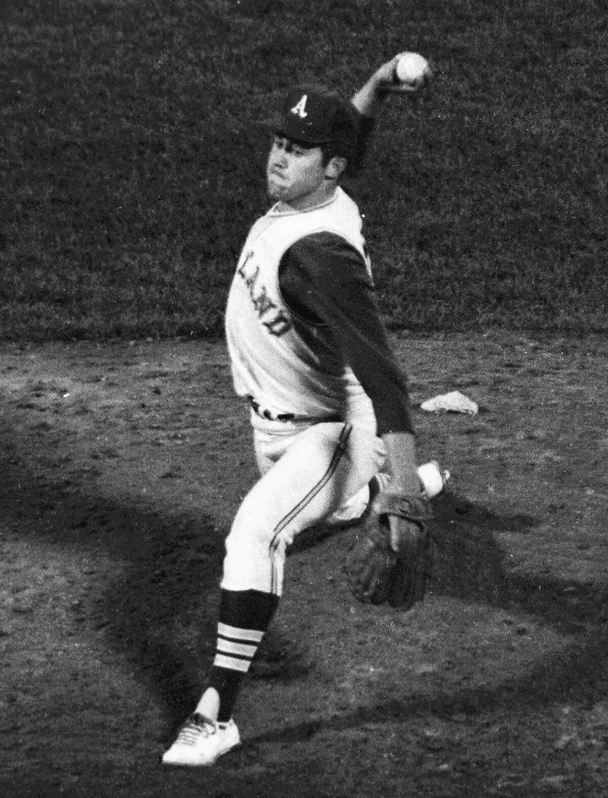 FILE--Jim "Catfish" Hunter bears down as he pitches to the last batter, Rich Resse of the Minnesota Twins, on his way to pitching a perfect game in this May 8, 1968 photo, in Oakland, Calif. Hunter, the Hall of Fame pitcher who ushered in baseball's era of big bucks for free agents, died today at age 53 after battling the disease named after another New York Yankees great, Lou Gehrig..(AP