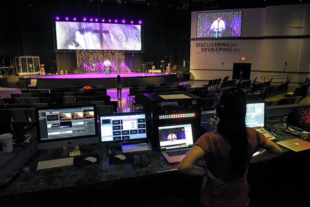 The Laredo First Assembly church Lead Pastor's Assistant Terry Jarrell helps produce an online Easter Sunday service in their empty hall, Sunday, Apr. 12, 2020, as social gatherings remain prohibited due to the COVID-19 coronavirus pandemic.