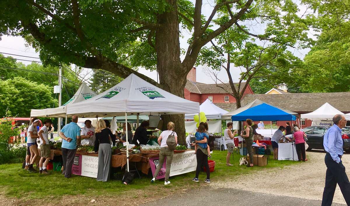 The Wilton Farmers Market is shown during a previous year. The Wilton Chamber of Commerce spotlights a local nonprofit organization each week at the Wilton Farmers Market, to help share their mission with the community. Students from Wilton High School recently produced a video showcasing the market, according to information from the Chamber.