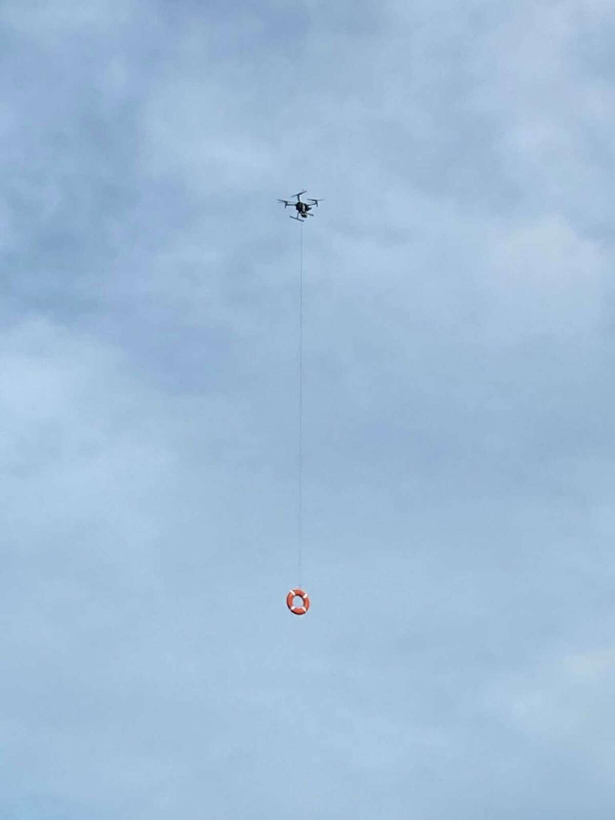 The Fairfield Police Department practicing using a drone to deploy personal floatation devices to struggling swimmers.