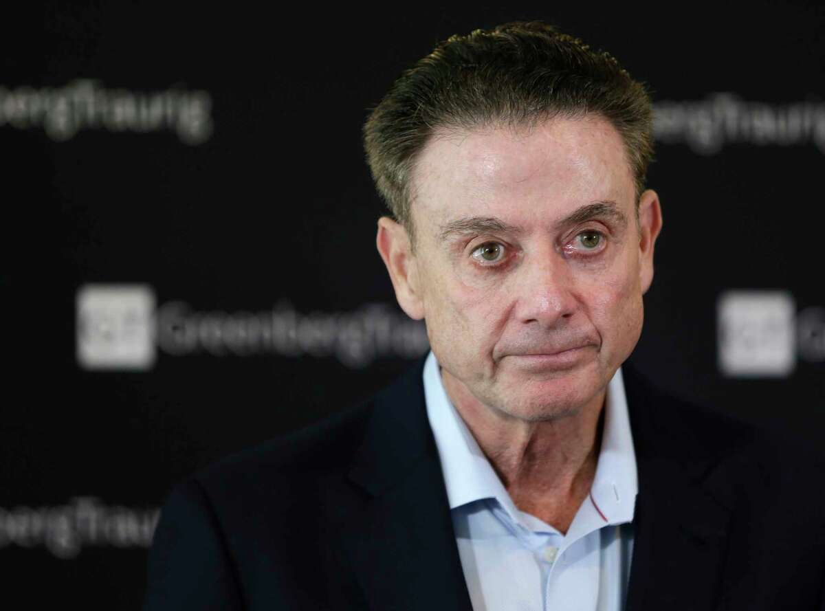 FILE - In this Feb. 21, 2018, file photo, former Louisville basketball Hall of Fame coach Rick Pitino talks to reporters during a news conference in New York. Louisville has received a notice of allegations from the NCAA that accuses the menas basketball program of committing a Level I violation with an improper recruiting offer and extra benefits and several Level II violations that accuse former Cardinals coach Rick Pitino of failing to promote an atmosphere of compliance. The notice released on Monday, May 4, 2020, is the completion of a two-year NCAA investigation following a federal corruption probe into college basketball.(AP Photo/Seth Wenig, File)