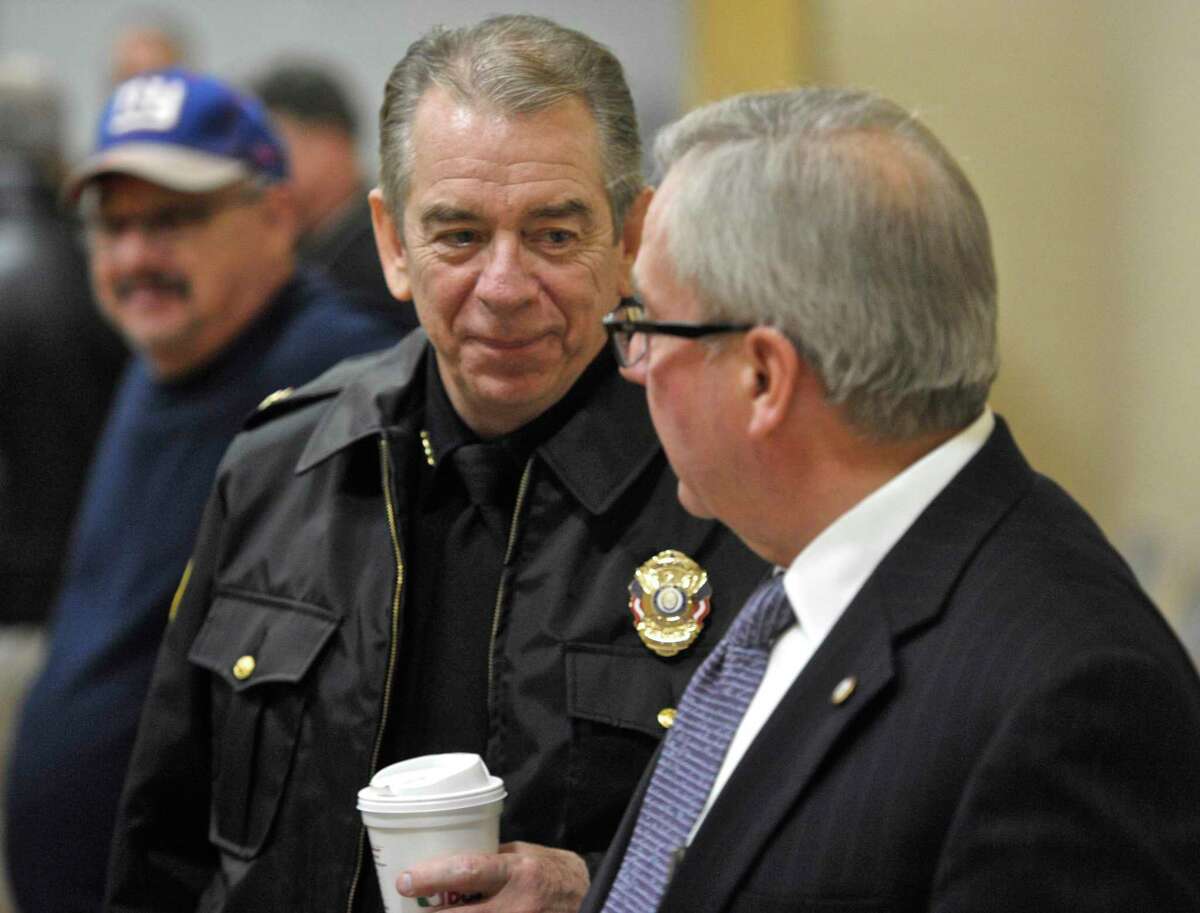 Bethel Police Chief Jeffrey Finch and First Selectman Matt Knickerbocker talk after the referendum on the new Bethel police station passed on Thursday night, December 17, 2015, in Bethel, Conn. They were at the Bethel municipal center for the final vote tally.