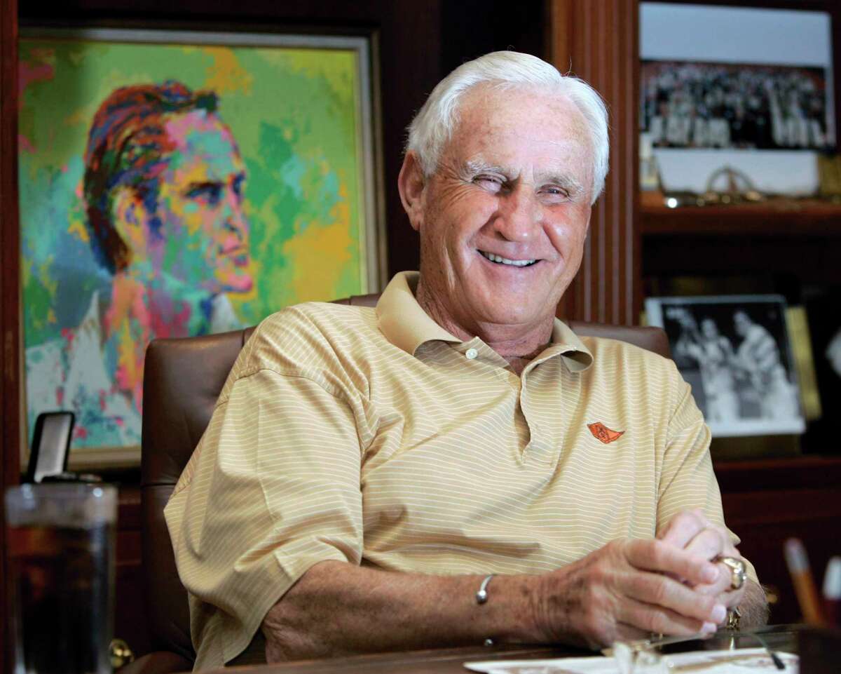 FILE - In this Nov. 8, 2007, file photo, Pro Football Hall of Fame coach Don Shula laughs during an interview at his home in Indian Creek, Fla. Shula, who won the most games of any NFL coach and led the Miami Dolphins to the only perfect season in league history, died Monday, May 4, 2020, at his home in Indian Creek, Fla., the team said. He was 90. (AP Photo/Wilfredo Lee, File)