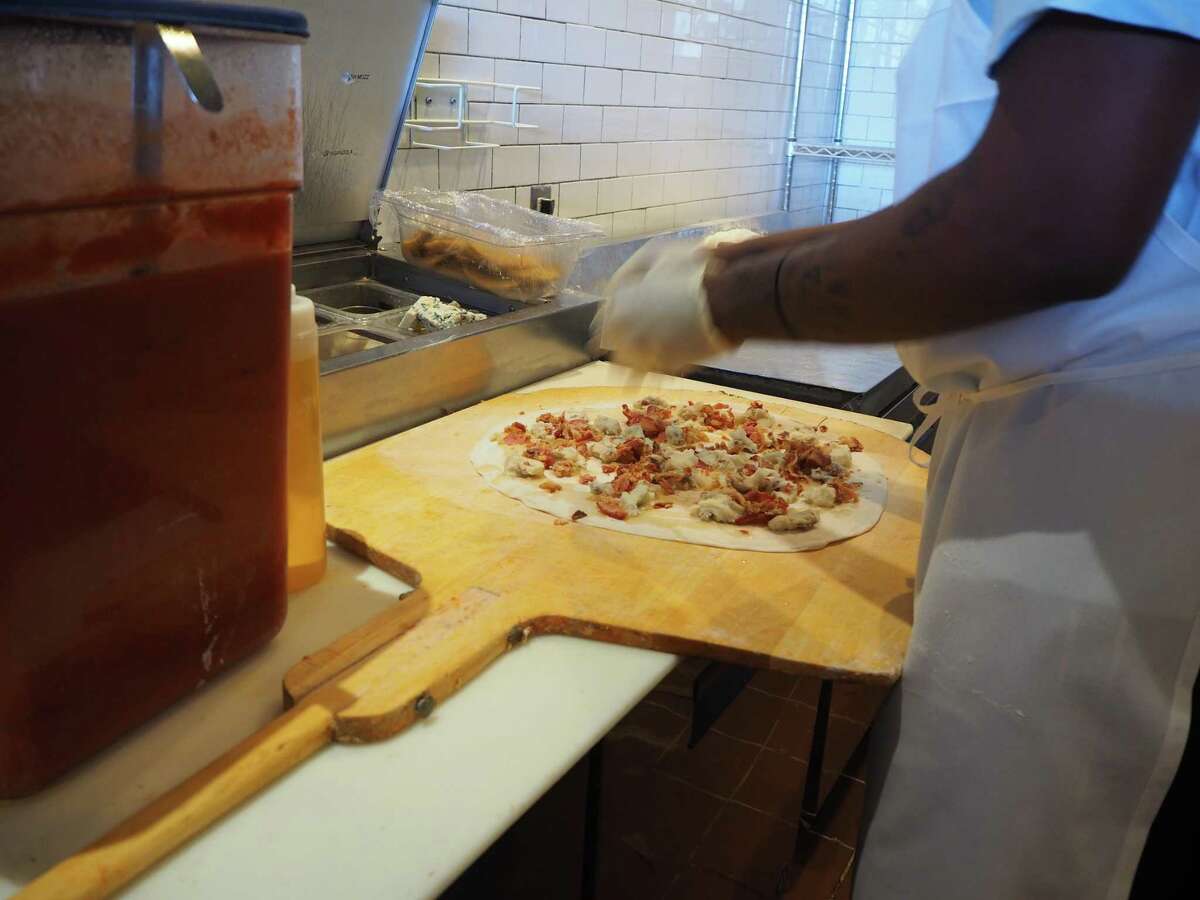 Brewport in Bridgeport said it retrained its staff to prepare food with masks and is changing up the seating area to provide more distance between customers.