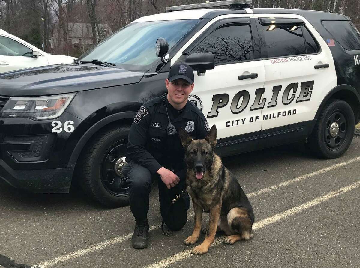 Milford Police Officer Kevin Hilliard with K9 Tyson.