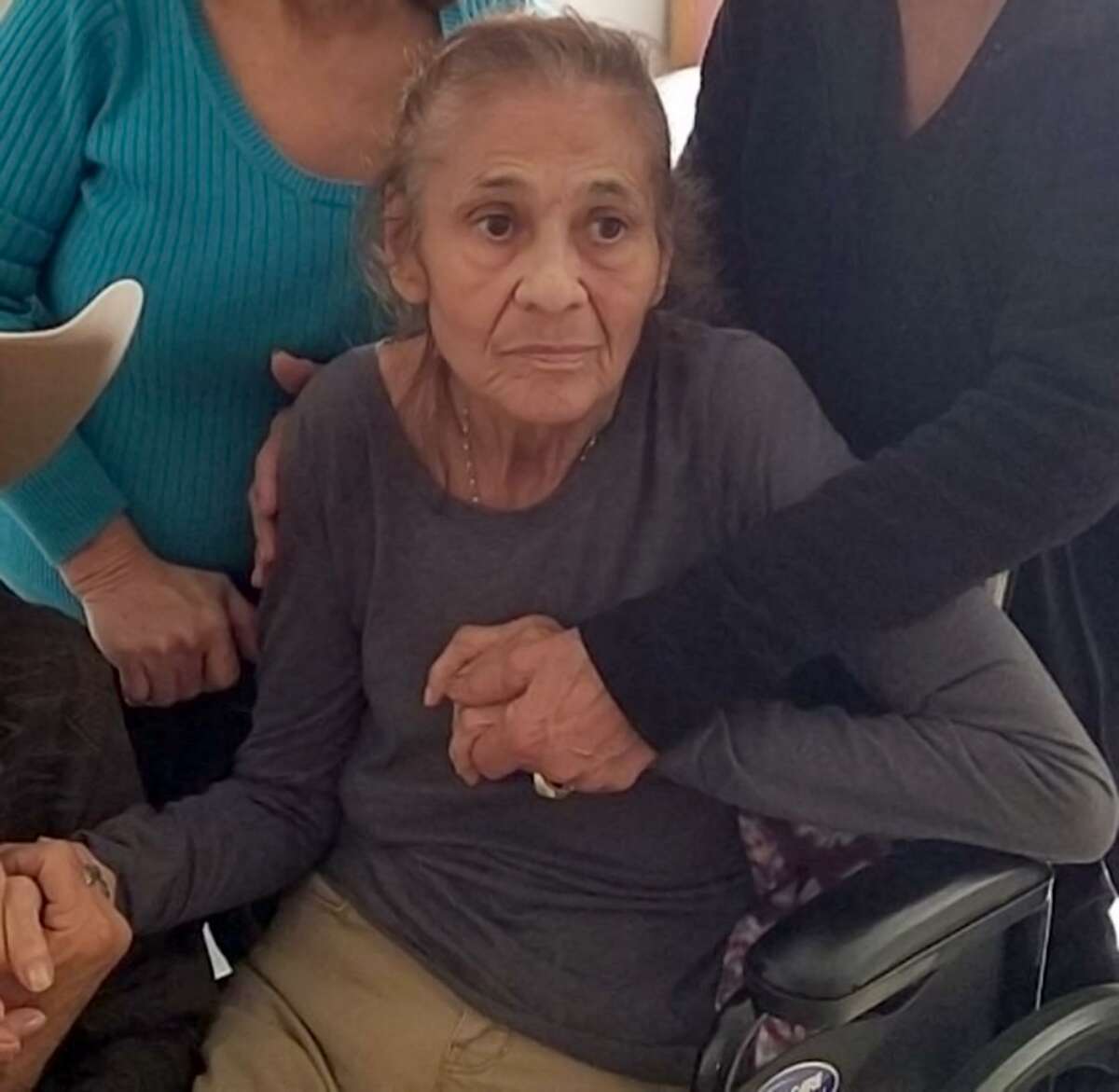 Family members surround Dolores Gutierrez DeLeon in this undated photo. DeLeon died April 23 at the age of 78. Her family has filed a lawsuit against Castillo Mission Funeral Home, alleging DeLeon’s body went missing. The family’s attorney said Wednesday it appears she was cremated under the name of another woman who died hte same day.