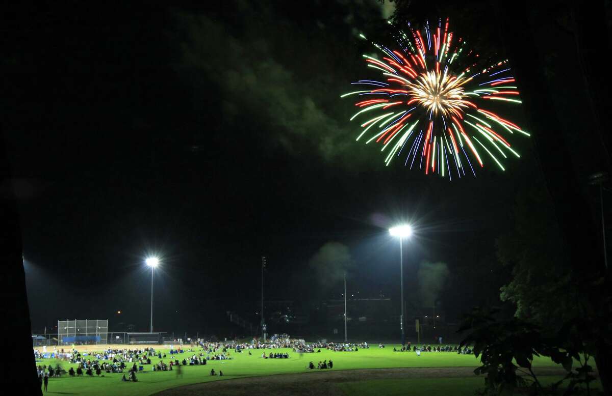 Wilton’s annual July 4 celebration has been canceled this year. Pictured: Fireworks over the crowd at Wilton High School on July 4, 2013.