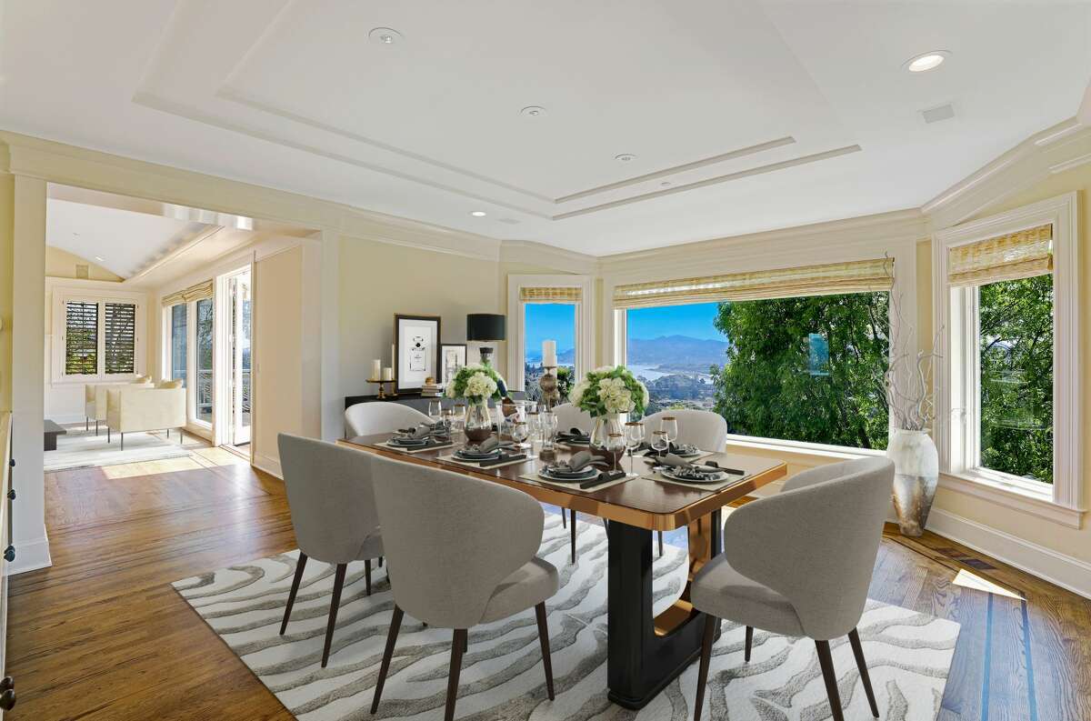 A formal dining room offers postcard views.