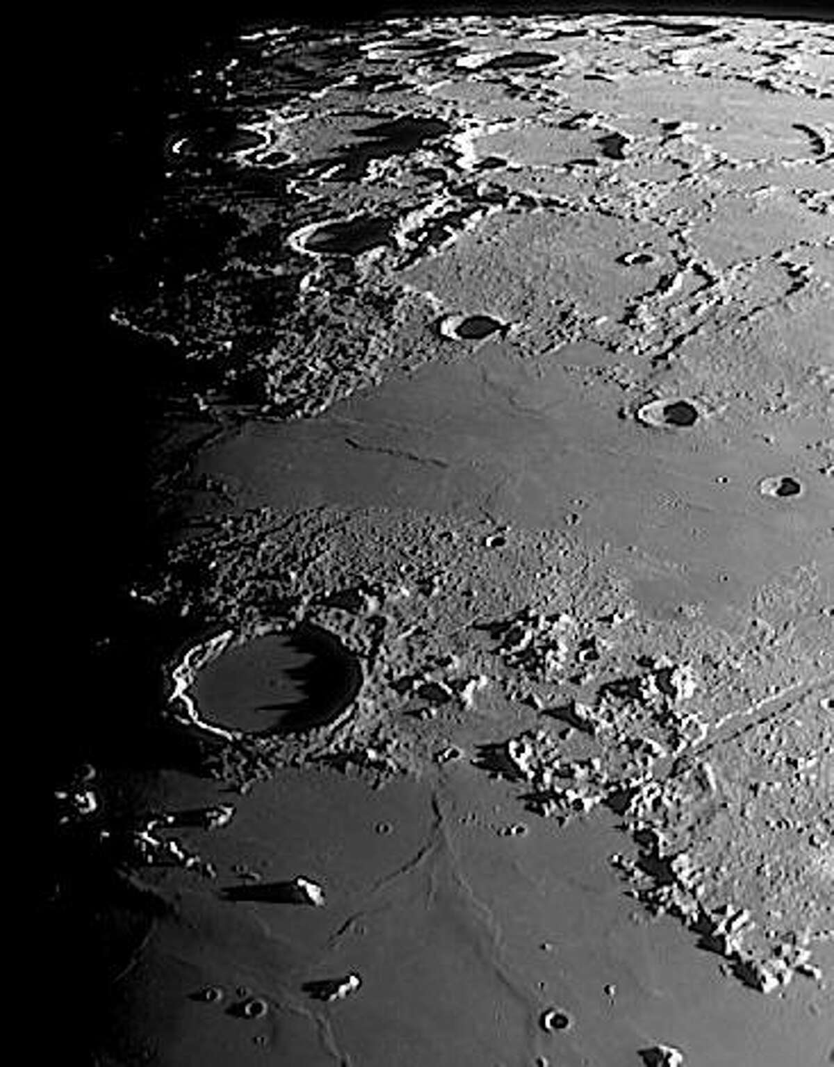 Images and videos of calm and serene scenes are being shared throughout the media and online during these stressful times. Bill Cloutier of the John J. McCarthy Observatory in New Milford captured this scene of a quiet corner of the moon April 1.The image features the crater Plato - named after ancient Greek philosopher Plato - located on the northern shore of the Mare Imbrium and at the western reach of the lunar Alpes. The crater is approximately 63 miles across, 4,800 feet in depth, with its floor flooded by an ancient lava flow. About 3.84 billion years old (slightly younger than the adjacent mare to the south), its jagged rims casts menacing shadows across the crater floor at sunrise. For those who are interested in learning more about Plato or other lunar features, contact the observatory at mccarthy.observatory@gmail.com to set up a possible webcast or informal observatory chat.