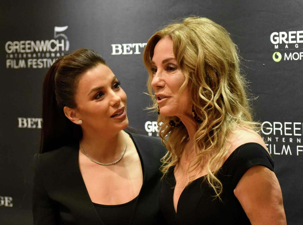 Actress Eva Longoria Bastón, left, and television host Kathie Lee Gifford chat at the Greenwich International Film Festival Changemaker Gala Meet & Greet cocktail reception at Betteridge Jewelers in Greenwich, Conn. Thursday, May 30, 2019. Celebrity Changemaker, Eva Longoria Bastón, was honored for her work with the Eva Longoria Foundation, while Community Changemaker, Bobby Walker, was honored for his work with the Boys & Girls Club of Greenwich. The black tie awards dinner at L'Escale emceed by television host and Greenwich resident Kathie Lee Gifford.