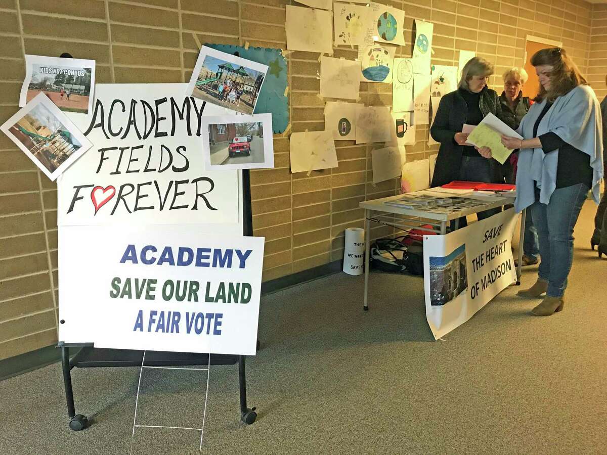 Residents turned out at a special meeting on the fate of the vacant Academy School. The grassroots group, ACADEMY - Save The Heart of Madison, met residents as they entered the public meeting.