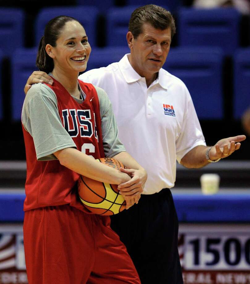 Geno Auriemma, head coach of the 2009 USA women’s basketball national team, stands with Sue Bird during their fall training camp at American University in Washington, D.C., in September 2009. Photo: Susan Walsh / Associated Press / AP