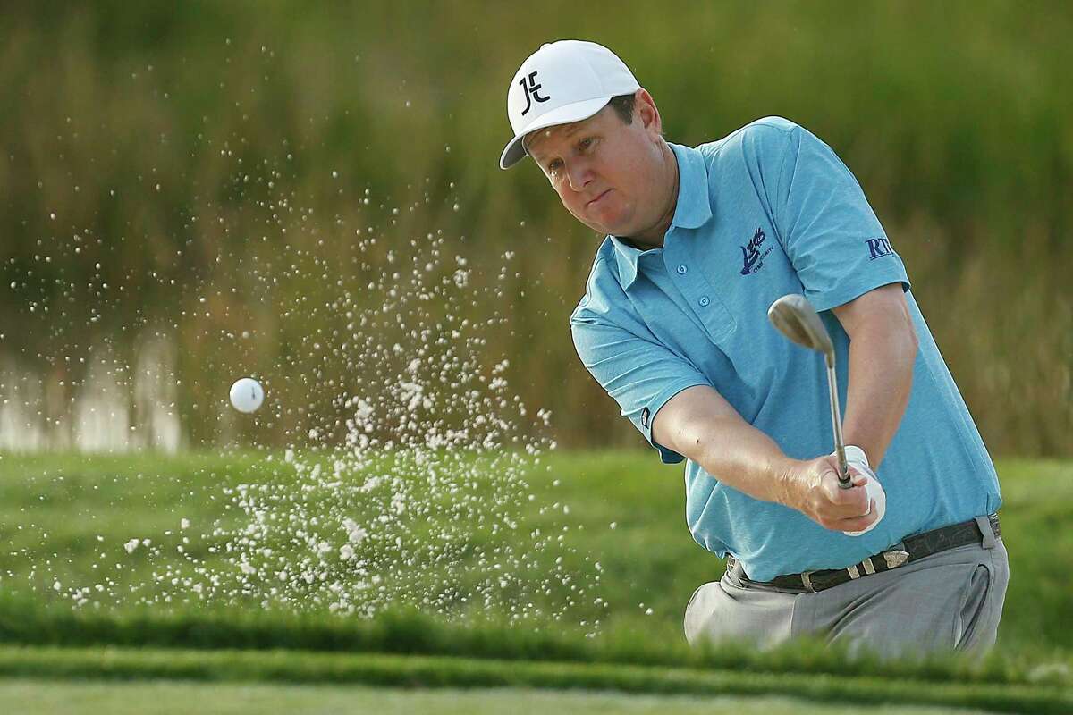 J.J. Henry plays a shot from a bunker on the second hole during the first round of the Honda Classic at PGA National Resort and Spa on Feb. 28, 2019 in Palm Beach Gardens, Fla.