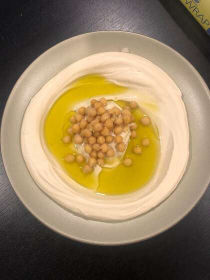 The owners of San Francisco restaurant Hummus Bodega describe their hummus as unusually rich, creamy and smooth like ice cream.