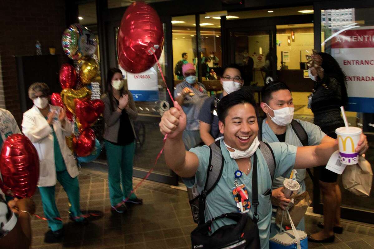 Night shift nurses are cheered and given balloons as they leave work on Wednesday, May 6, 2020 at CHI St. Luke's Health - Baylor St. Luke's Medical Center in Houston. In honor of National Nurses Week and kicking off on National Nurses Day, Party City surprised the hospital's night shift nurses as they got off work.