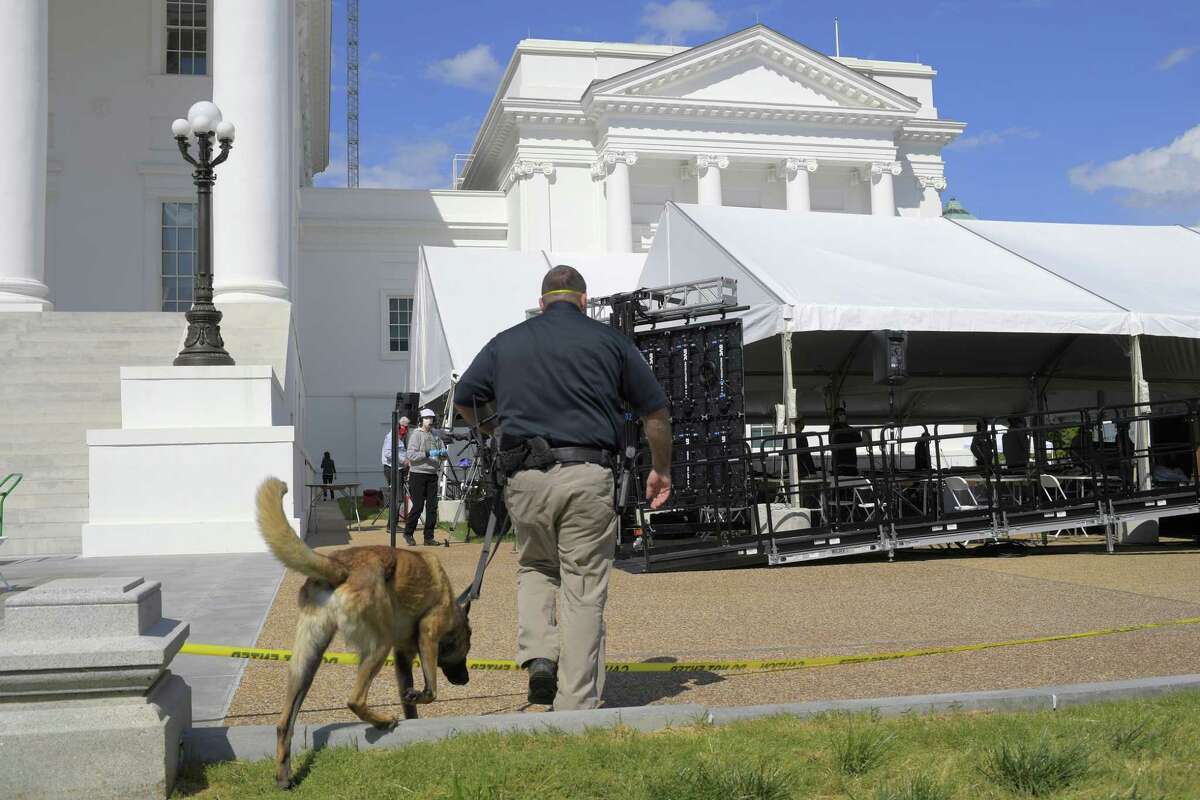 Virginia's House of Delegates met under a canopy outside the state Capitol in April as a precaution against the novel coronavirus. (