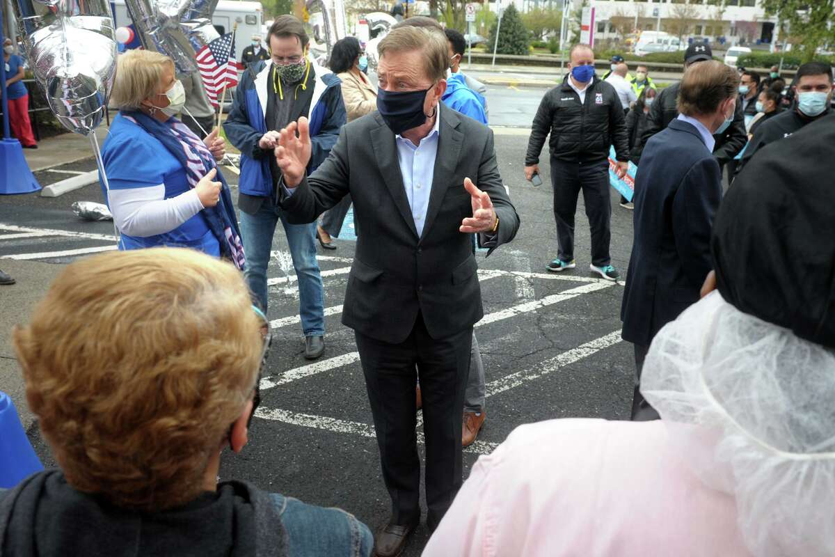 Gov. Ned Lamont speaks during a thankyou rally in front of Northbridge Health Care Center in Bridgeport, Conn. May 1, 2020. Several elected officials stopped at Northbridge Friday to thank the staff, where dozens of COVID-19 patients have been sent for recovery.