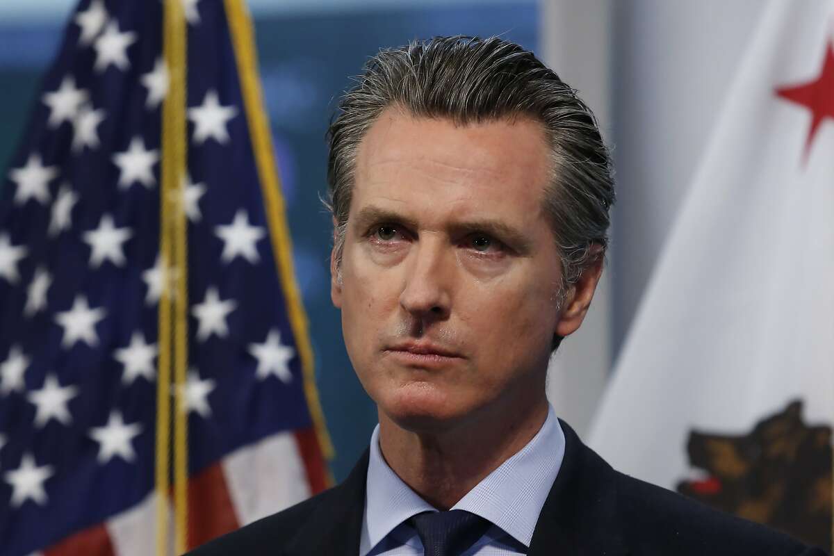 FILE - In this April 9, 2020, file photo, California Gov. Gavin Newsom listens to a reporter's question during his daily news briefing in Rancho Cordova, Calif.
