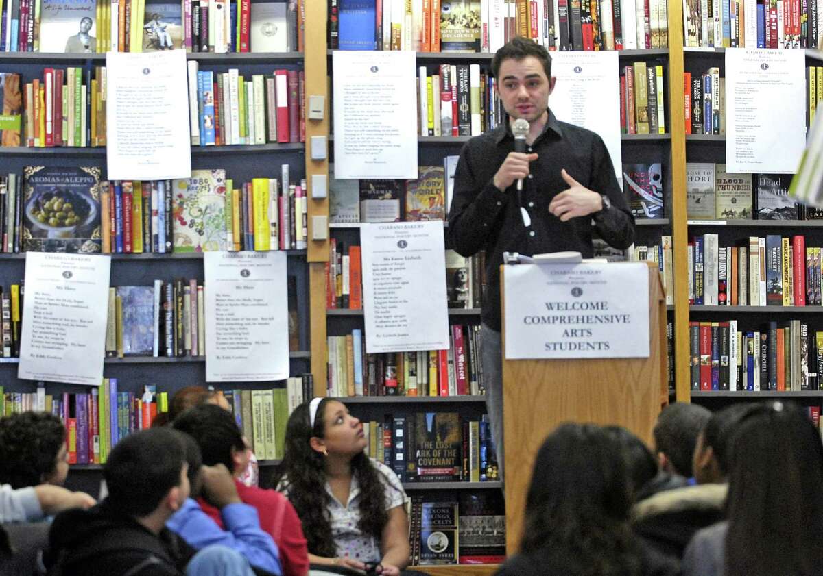 Poet Aaron Jefferis hosts a poetry reading with students from New Haven's Truman School and Fair Haven School in 2008.