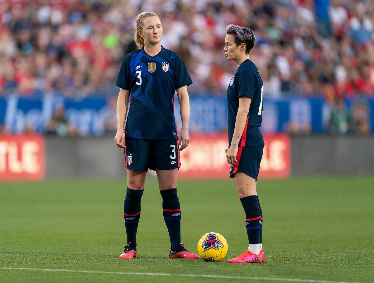 FRISCO, TX - MARCH 11: Sam Mewis #3 and Megan Rapinoe #15 of the United States talk during a game between Japan and USWNT at Toyota Stadium on March 11, 2020 in Frisco, Texas. ~~