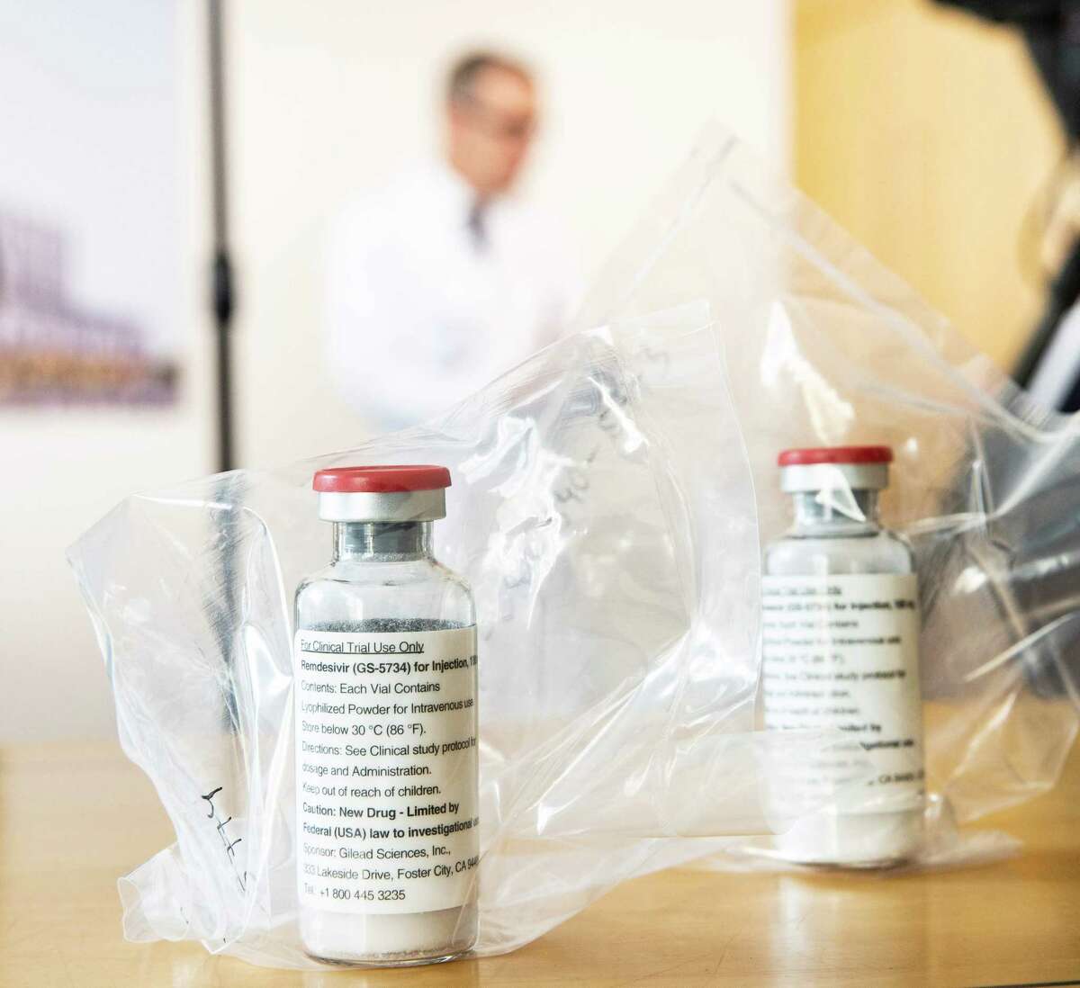 Vials of the drug remdesivir lie during a press conference about the start of a study with the Ebola drug remdesivir in particularly severely ill patients at the University Hospital Eppendorf (UKE) in Hamburg, northern Germany on April 8, 2020, amid the new coronavirus COVID-19 pandemic.