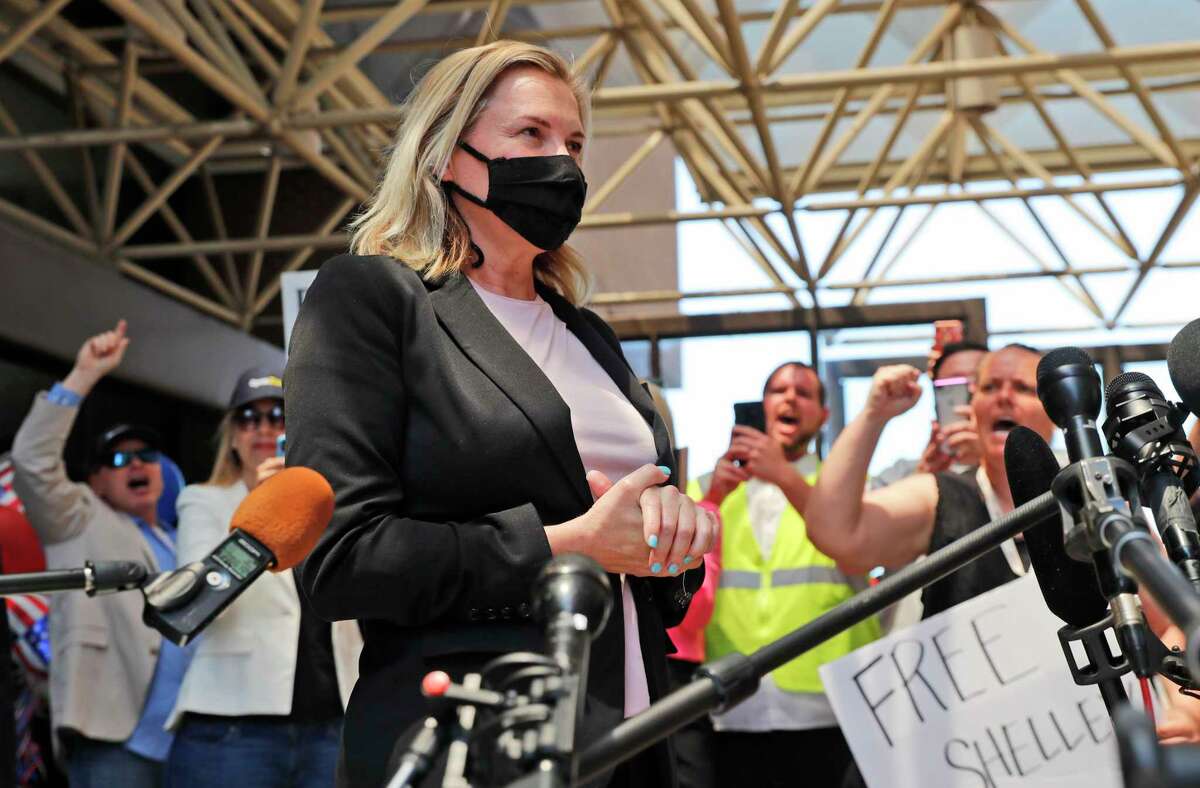 Salon owner Shelley Luther begins to speak to the media after she was released from jail in Dallas, Thursday, May 7, 2020. Luther was jailed for refusing to keep her business closed amid concerns of the spread of COVID-19.