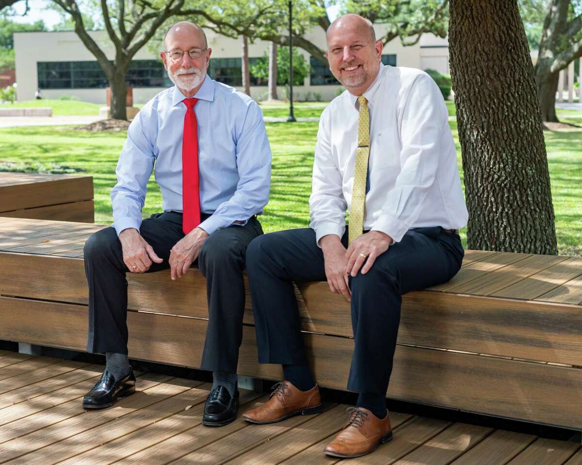 Lamar University President Ken Evans sits for a portrait with George Saltsman, director, Center for Educational Innovation and Digital Learning on the college quad. Photo made on May 1, 2020. Fran Ruchalski/The Enterprise