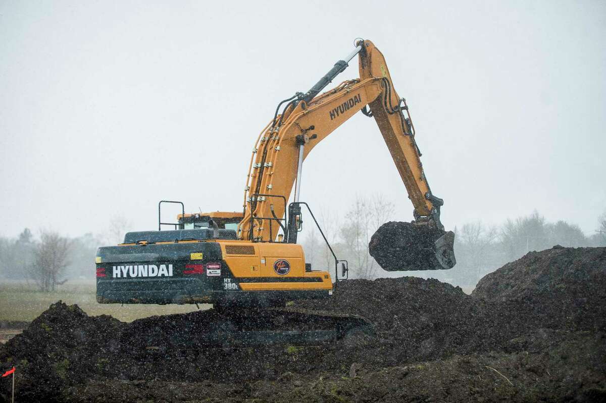 Construction work is underway at the site of the future Costco at the intersection of Bay City Road and Rockwell Drive Friday, May 8, 2020 in Midland. (Katy Kildee/kkildee@mdn.net)