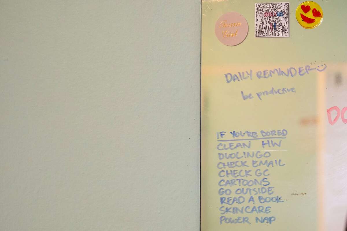 A motivational to-do list is seen written on Ligaya Chinn's mirror in her bedroom at her home in Oakland, Calif. Thursday, May 7, 2020. For the first time, high school AP tests will be administered online only in a take-home setting due to the Coronavirus pandemic and shelter-in-place order.