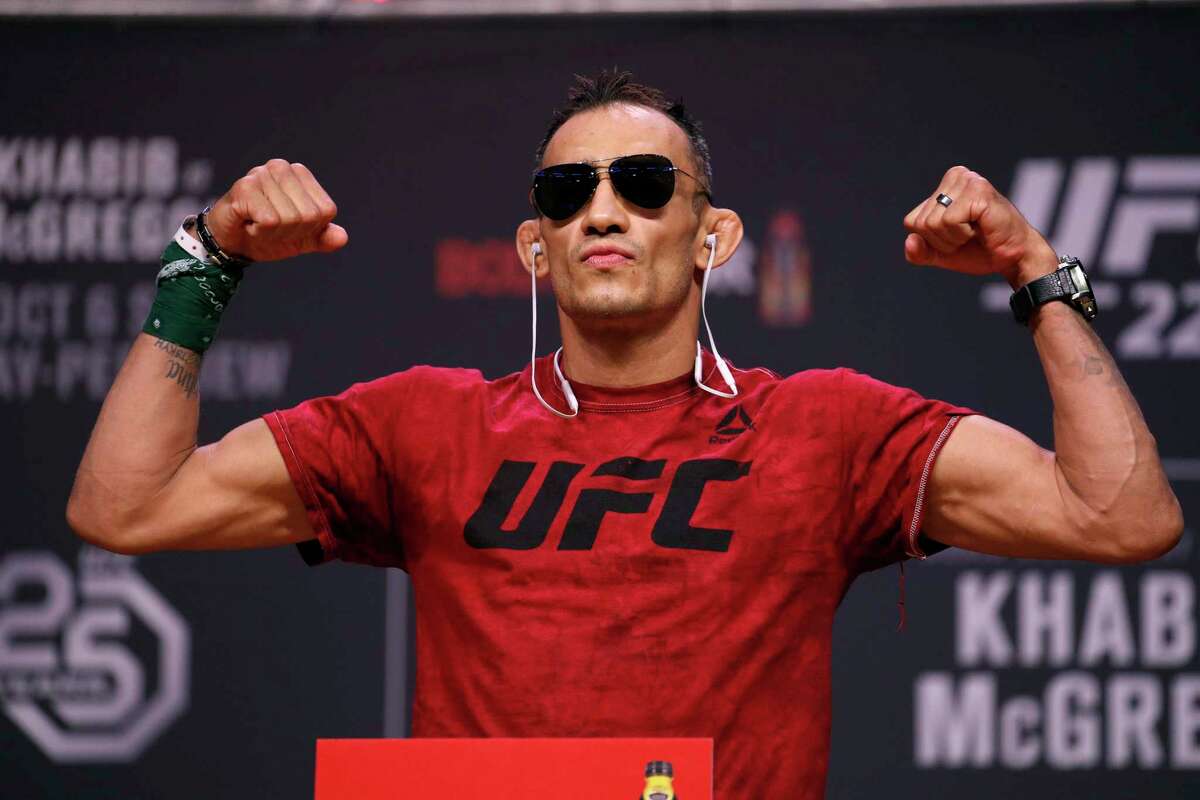 FILE - In this Oct. 5, 2018, file photo, Tony Ferguson poses during a ceremonial weigh-in for a UFC 229 mixed martial arts fight in Las Vegas. UFC 249 scheduled for May 9, 2020, at Jacksonville Arena will be headlined by lightweight title contenders Tony Ferguson and Justin Gaethje. (AP Photo/John Locher, File)